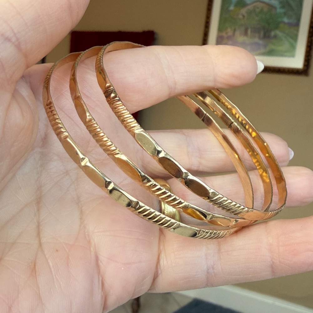 10 karat gold three bangles set